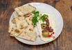Flatbread with Hummus or with Tzatziki